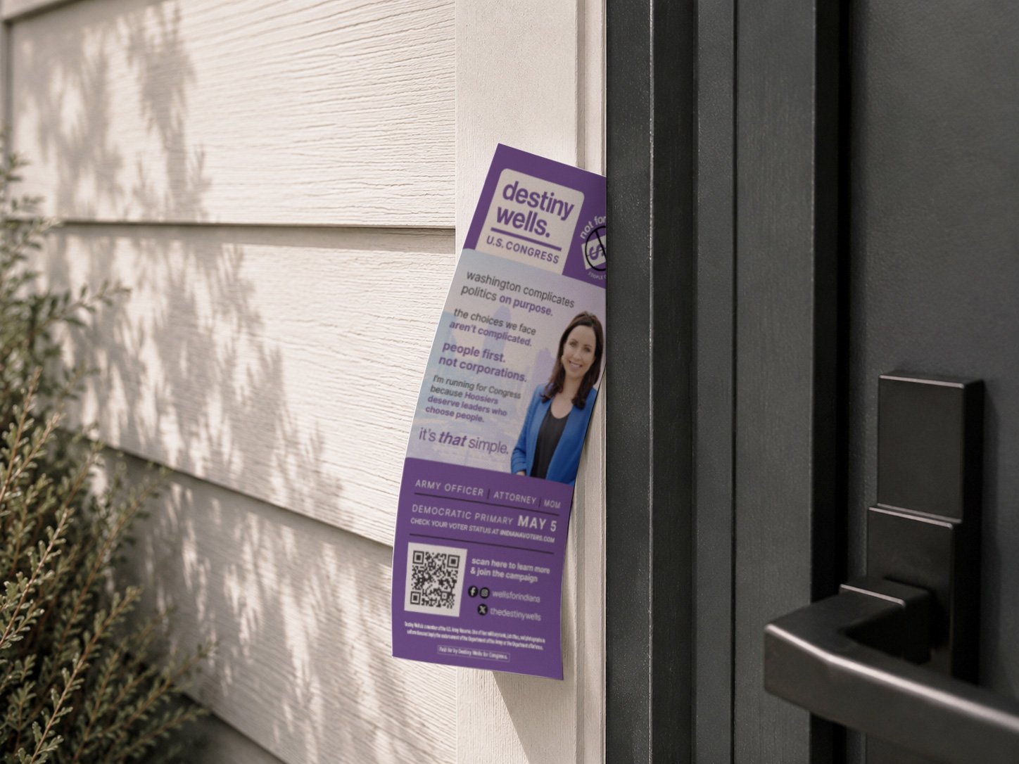 Destiny Wells U.S. Congress leave-behind card stuck in door example