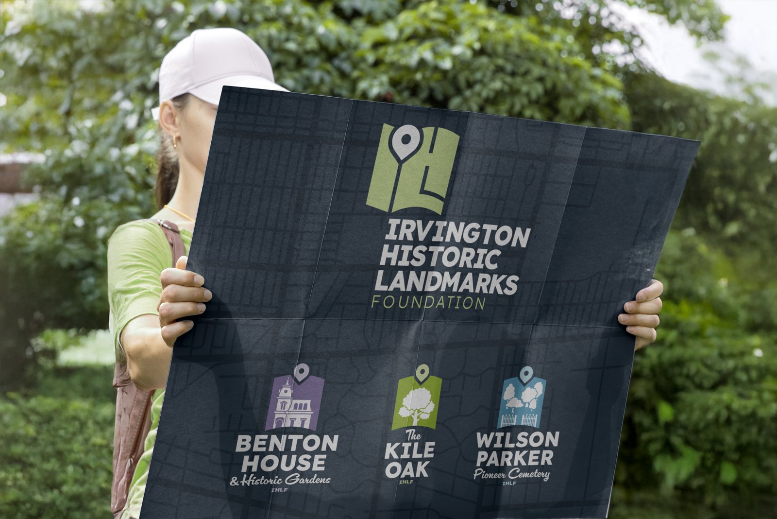 Irvington Historic Landmarks Foundation brand example on a paper map held by a person.